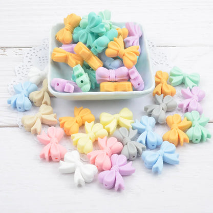 Bowknot 10pcs/lot Silicone Beads DIY Food Grade Silicone Teething Pacifier Cute Shaped Silicone teether Holder Accessories